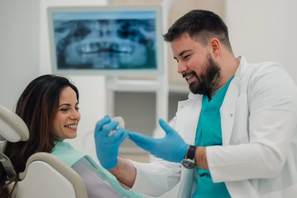 dentist discussing an Endodontics treatment plan to patient