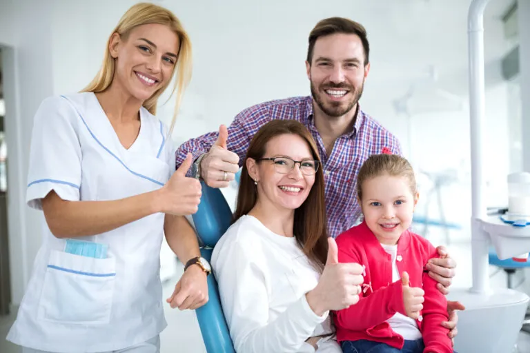 happy family at dentist